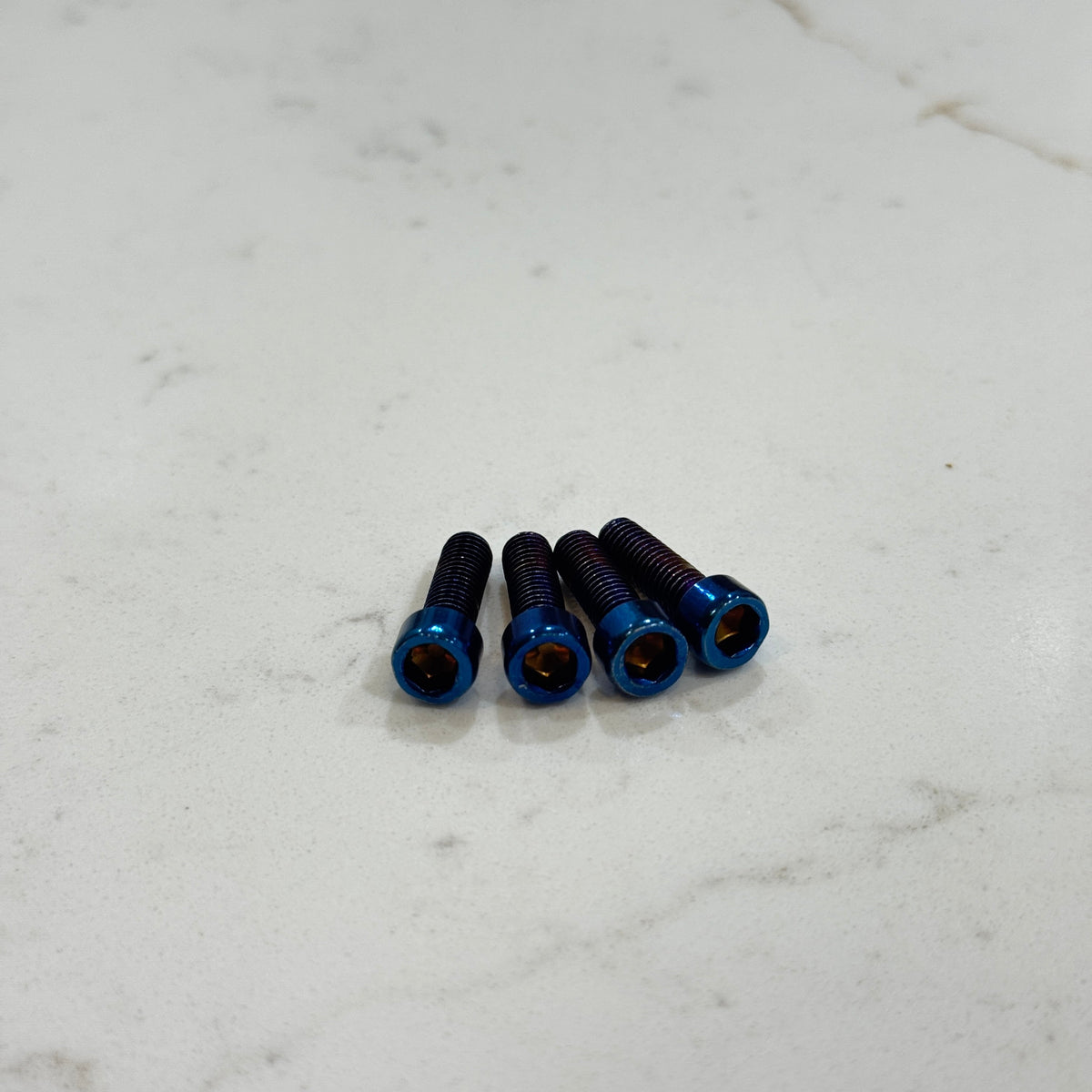 Surron Titanium Fork Axle Pinch Bolts | 4-Piece Burnt Blue Set