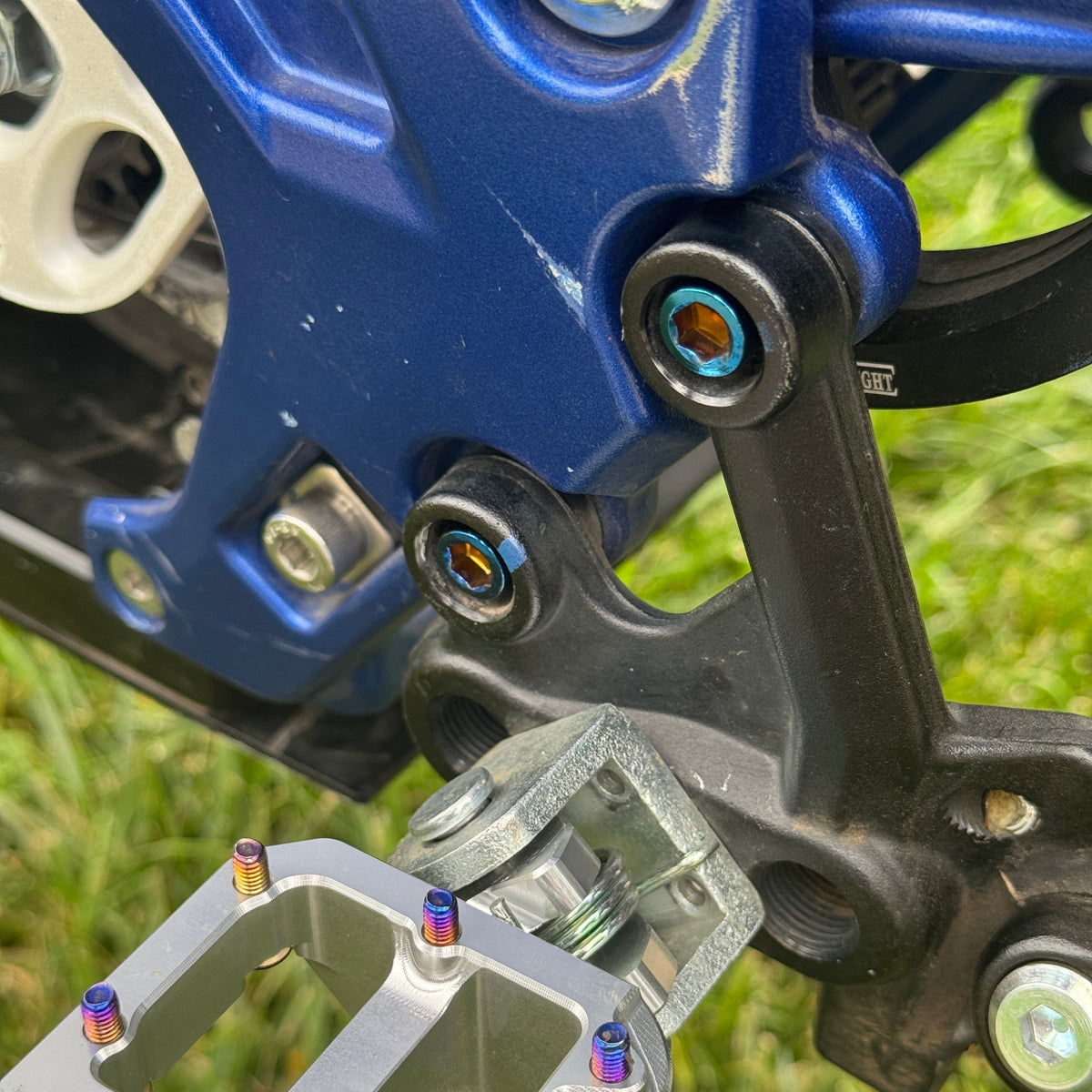 Burnt Blue Titanium Peg Mount Bolts for Surron & E-Moto | Set of 4