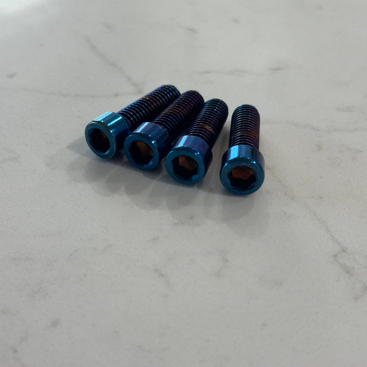 Burnt Blue Titanium Peg Mount Bolts for Surron & E-Moto | Set of 4