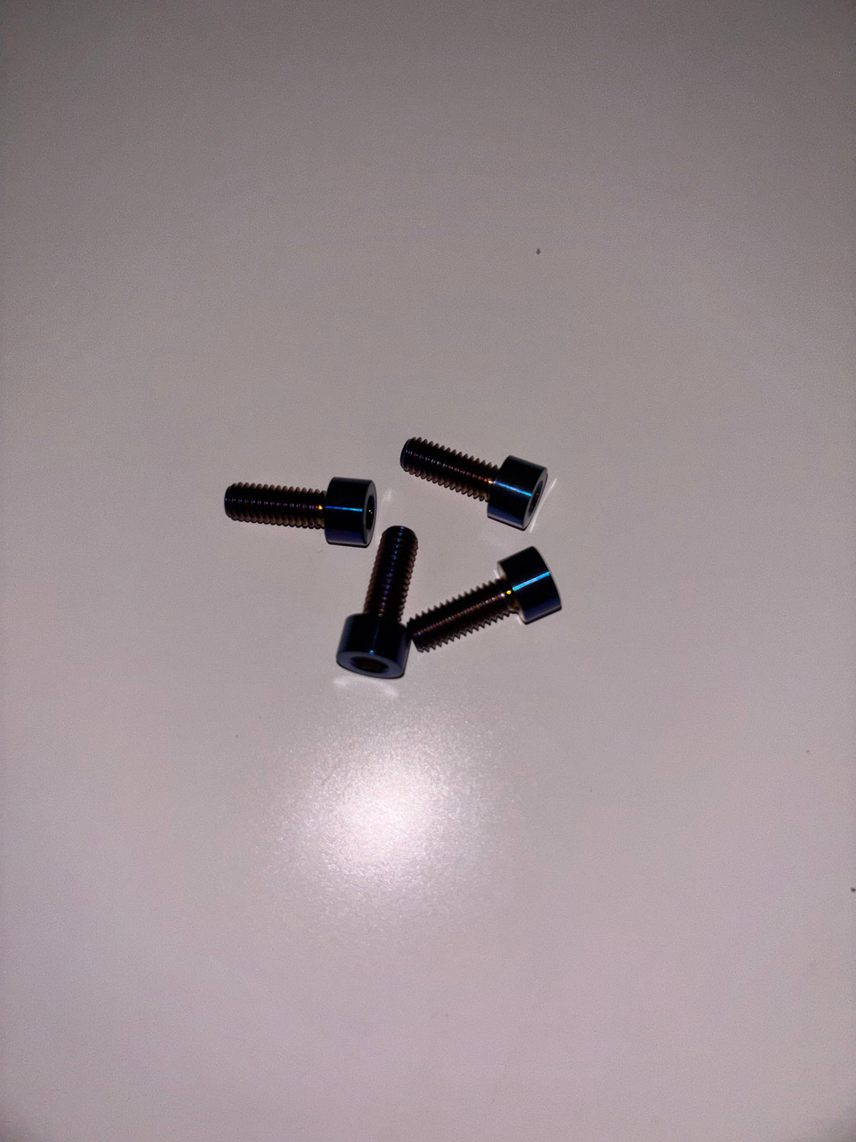 Surron Ultra Bee Titanium Side-Panel Bolts – 4-Piece Set