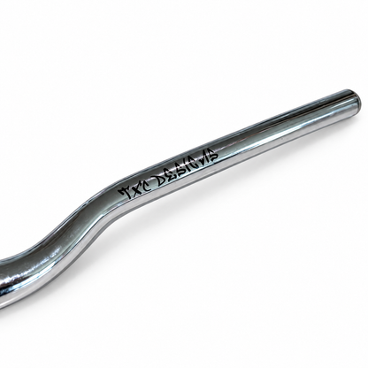Mirror chrome TXC Vanta Series 31.8 mm direct-mount e-moto handlebar, close-up of the TXC Designs branding.