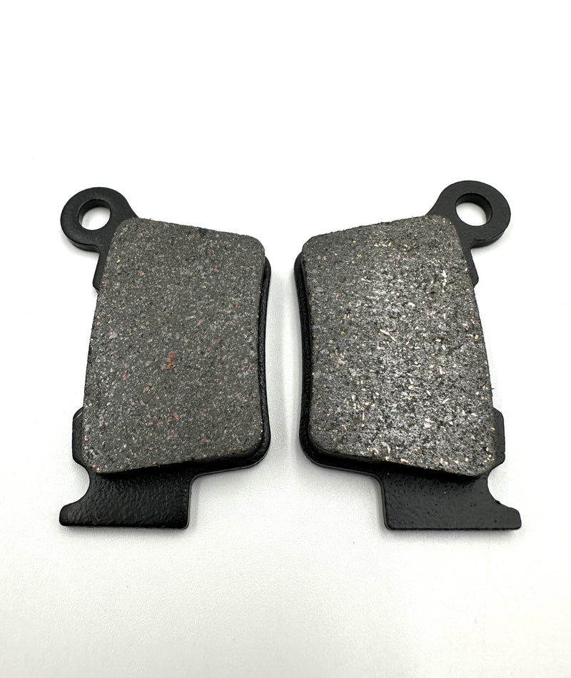 Pair of Stark Varg rear brake pads with ceramic-Kevlar friction material